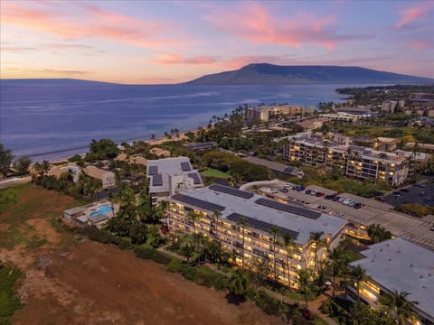 Aerial view of the property showing proximately to beach. Steps to Kama'ole Beach II.