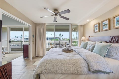 Relax and enjoy the aloha spirit! Two sets of sliding doors exiting to balcony with nice views from both rooms.