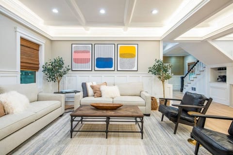 Grand living space with 11 foot coffered ceilings.