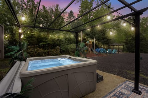 Relax and unwind with friends in our spacious hot tub, perfect for accommodating up to six people.
