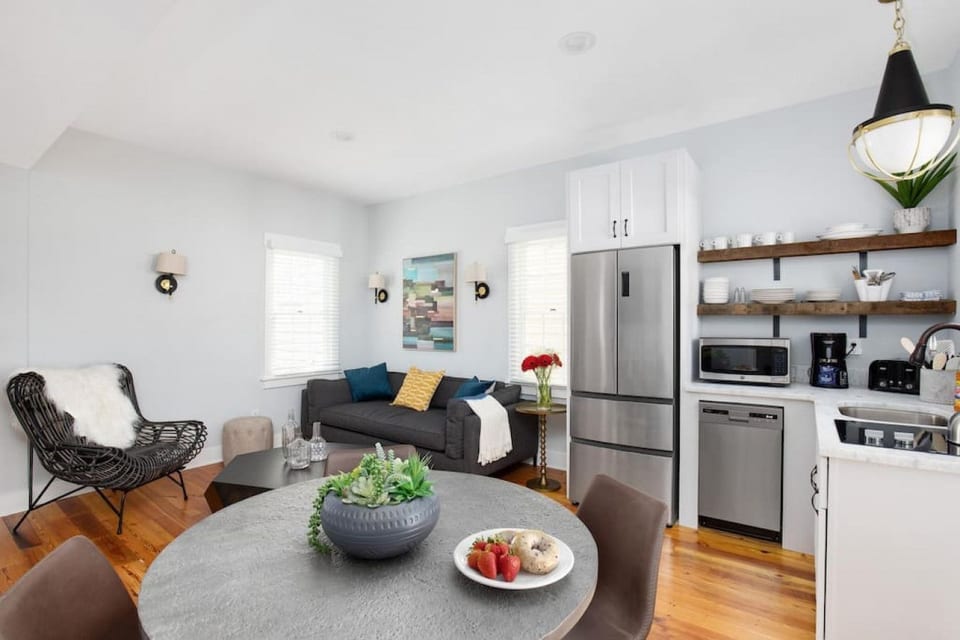 Open-concept kitchen, dining and living room, all on one level. Cook together in the full kitchen, then gather around the table for 4 while everyone swaps plans for the day.