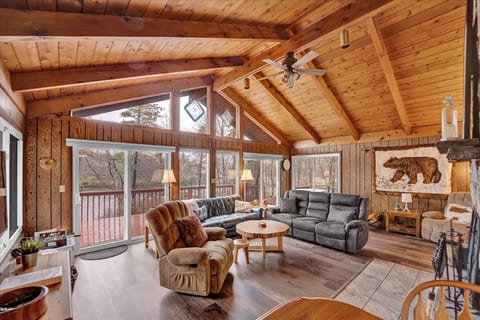 Spacious living area with plenty of natural light and comfortable seating