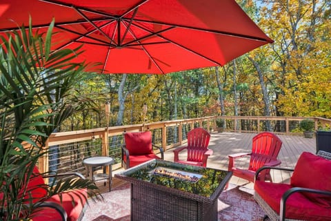 Backdeck patio featuring a firepit table for warmth and ambiance