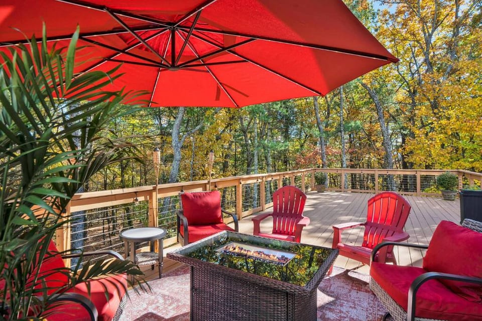 Backdeck patio featuring a firepit table for warmth and ambiance