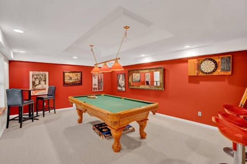 Billiards and socializing come together in the basement hangout