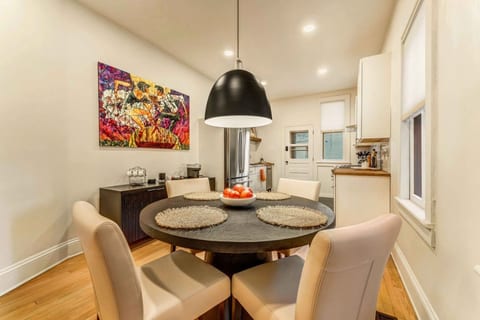 Additional dining convenience awaits with this secondary table for four, perfectly situated in the kitchen area for casual meals or extra seating!