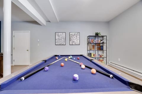 Challenge your friends and family to a fun game of pool in the cozy game area—perfect for friendly competition and relaxation!