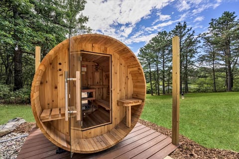 Relax, detox, and recharge in a cozy sauna surrounded by nature.