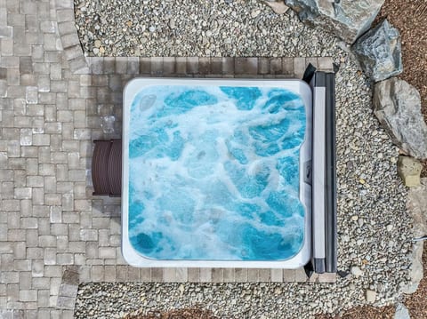 Soak, relax, and unwind—your private hot tub escape awaits.
