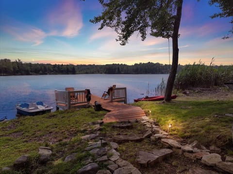 Golden hour, glassy water, and complete serenity — all from your private dock.