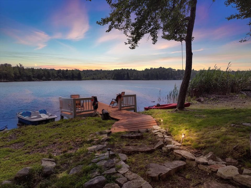 Golden hour, glassy water, and complete serenity — all from your private dock.