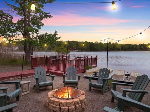 Enjoy peaceful twilight evenings by the lake, where the firepit sets the perfect ambiance for relaxation and connection.