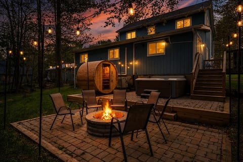 Your backyard oasis awaits! Unwind in the hot tub, relax in the sauna, or gather around the fire pit for cozy evenings under the stars.