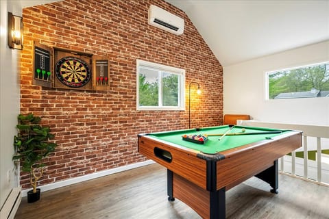 Game on! Enjoy endless fun with a pool table and dartboard on the second level—perfect for friendly competitions and making memories with your group.