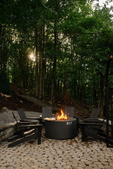 Gather around the propane firepit for cozy evenings filled with conversation, laughter, and s'mores under the stars.