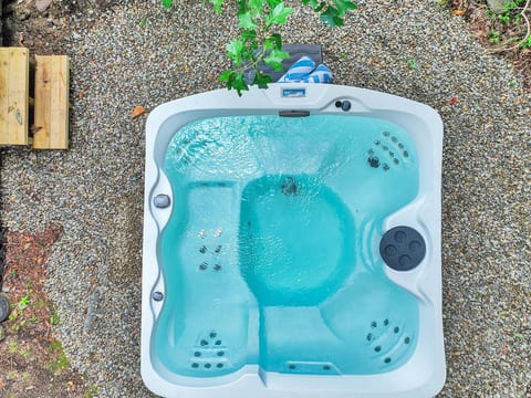 Soak, unwind, and recharge in the private hot tub after a day of hiking, skiing, or exploring the Poconos.