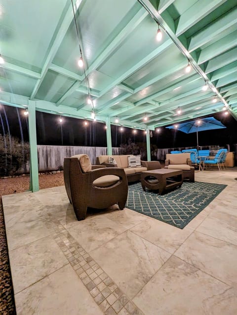 Bistro lights create an intimate space to gather and relax after a long day.