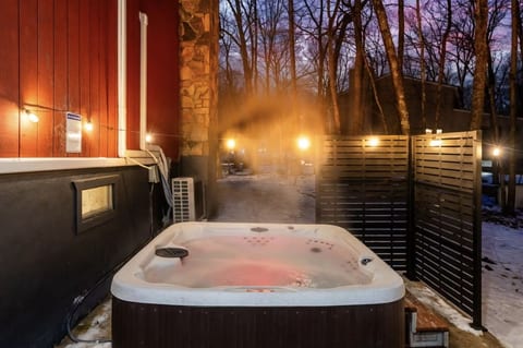 Soak, relax, and let your worries melt away in your private hot tub.