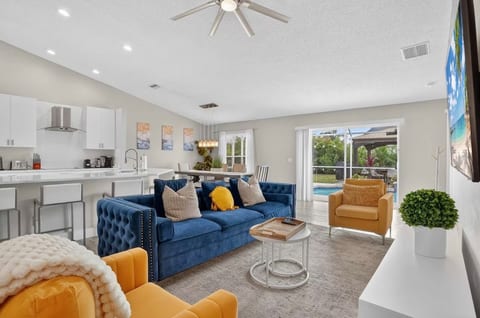 Living room with ample seating large television.