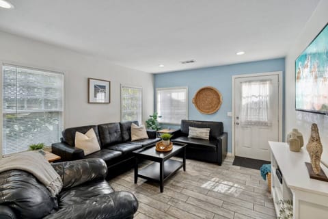 Large open living room, TV and lots of sunshine! This room offers maximum comfort.