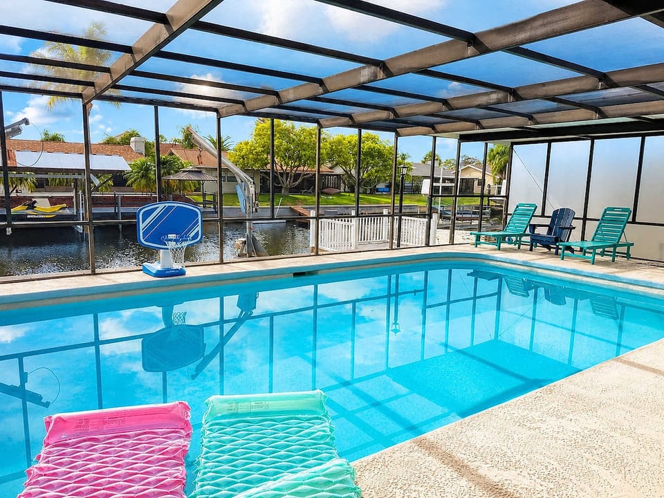 Enjoy swimming in the waterfront heated pool