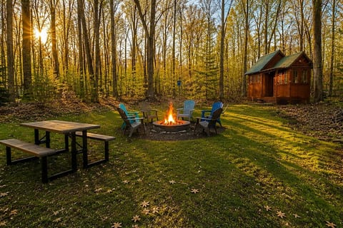 As you step outside, you’ll be able to enjoy our entertaining backyard with a picnic table, bonfire and string lights or enjoy the bonus game room with a table to play games and darts.