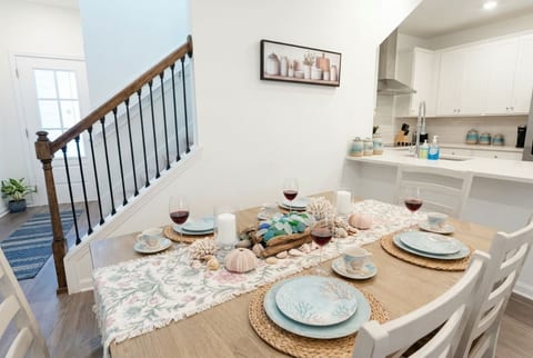 Gather around the beautifully styled dining table for family meals, game nights, or sunset dinners — every seat feels like a special occasion.