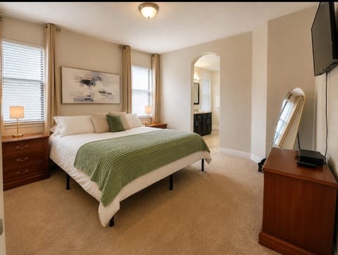 Primary Suite 1. Spacious primary suite with king bed and ensuite bath.