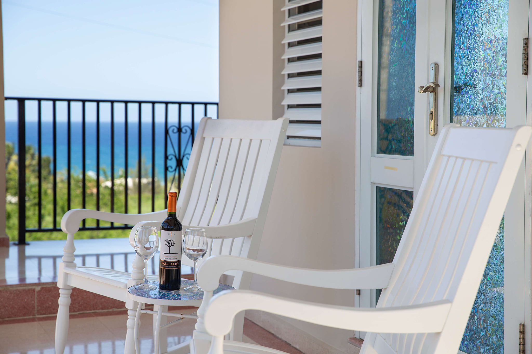 One of 3 spacious covered oceanview balconies