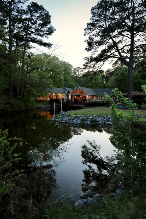 Serene lakeside retreat at dusk