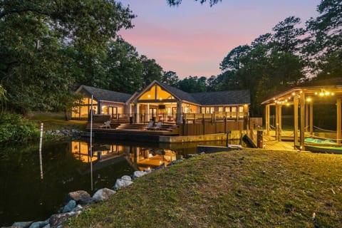 Serene waterfront retreat at sunset