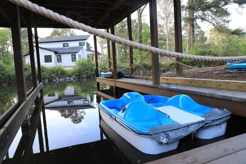 Charming dock with paddleboat access