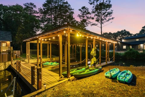 Charming dock with kayaks at sunset