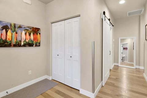 Entry way with coat closet with hangers and extra storage for your extended stay.