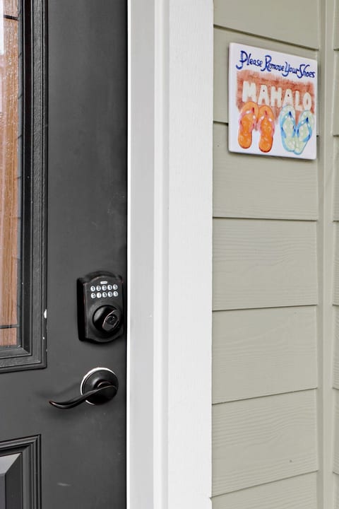 Main entrance into apartment featuring keyless entry