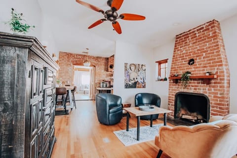 Front living room with decorative fireplace.