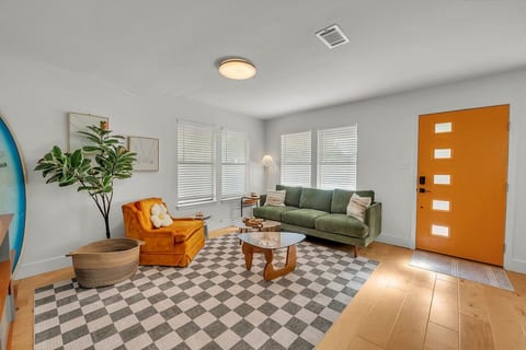 Bright, playful gathering space — perfect for game nights or pre-festival hangs