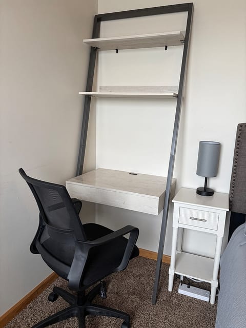 Queen Room B - Workspace desk with USB outlet and office chair.