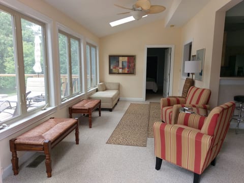 Sun room with entrance to 1st floor master.