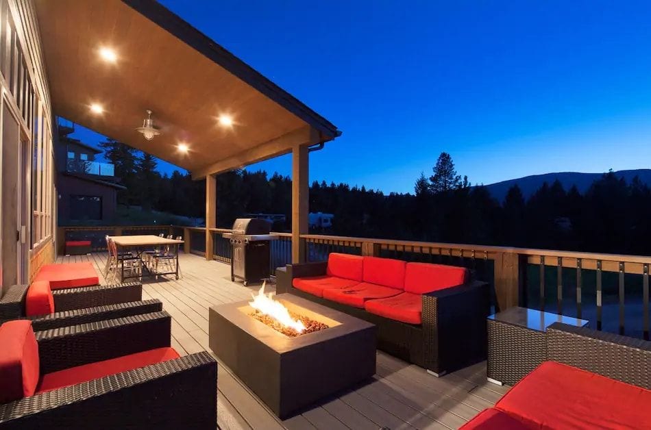 Front patio complete with dining table, BBQ, and a
fire table