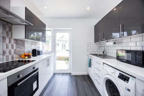A bright, fully equipped shared kitchen with everything you need to prepare your favourite meals and feel at home during your stay