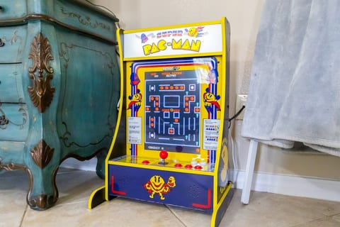 Retro Super Pac‑Man arcade brings family fun and nostalgia to your stay.