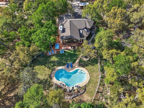 Secluded hill-country retreat with freeform pool and spacious yard