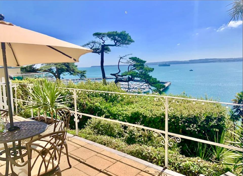 Stunning panoramic ocean views from the private balcony — the perfect spot for morning coffee or sunset unwinding.