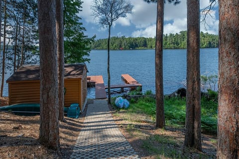 The waterfront includes 2 kayaks, 1 canoe, 1 water mat, 2 SUP boards along with paddles and 6 adult life jackets. There is space for 2 boats with cleats on the dock.