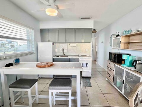 Microwave, keurig, hot water kettle, and toaster provided