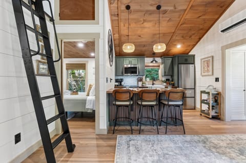 Charming kitchen with cozy loft access