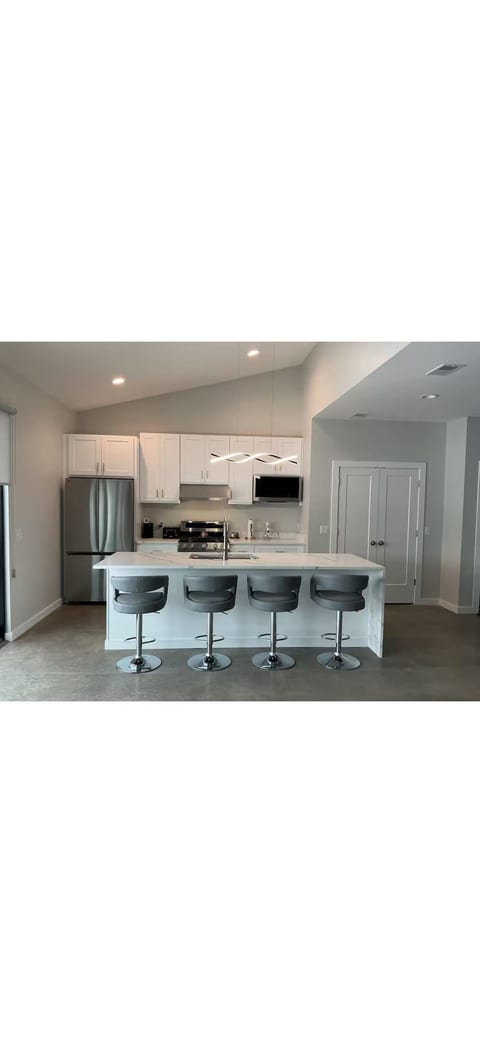 Enjoy the Kitchen with well stocked pantry