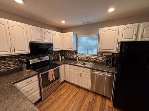 Fully stocked kitchen including basic cooking essentials (oil, salt, pepper, seasonings,etc).