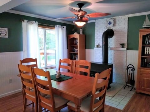 Dining room and woodburning stove.